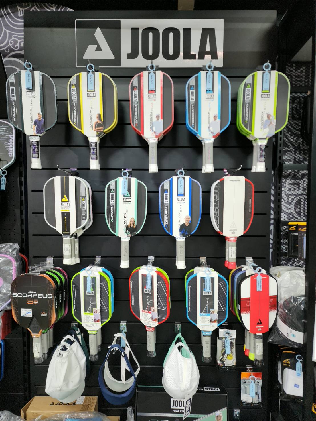 JOOLA paddle wall at the DINK A LOT Pro Shop
